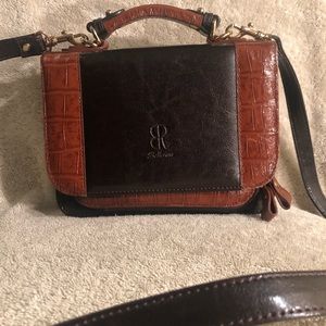 Selling a super cute bag with lots of compartments